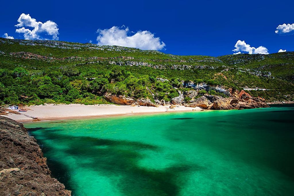 dos Coelhos beach is a hidden paradise surrounded by greenery