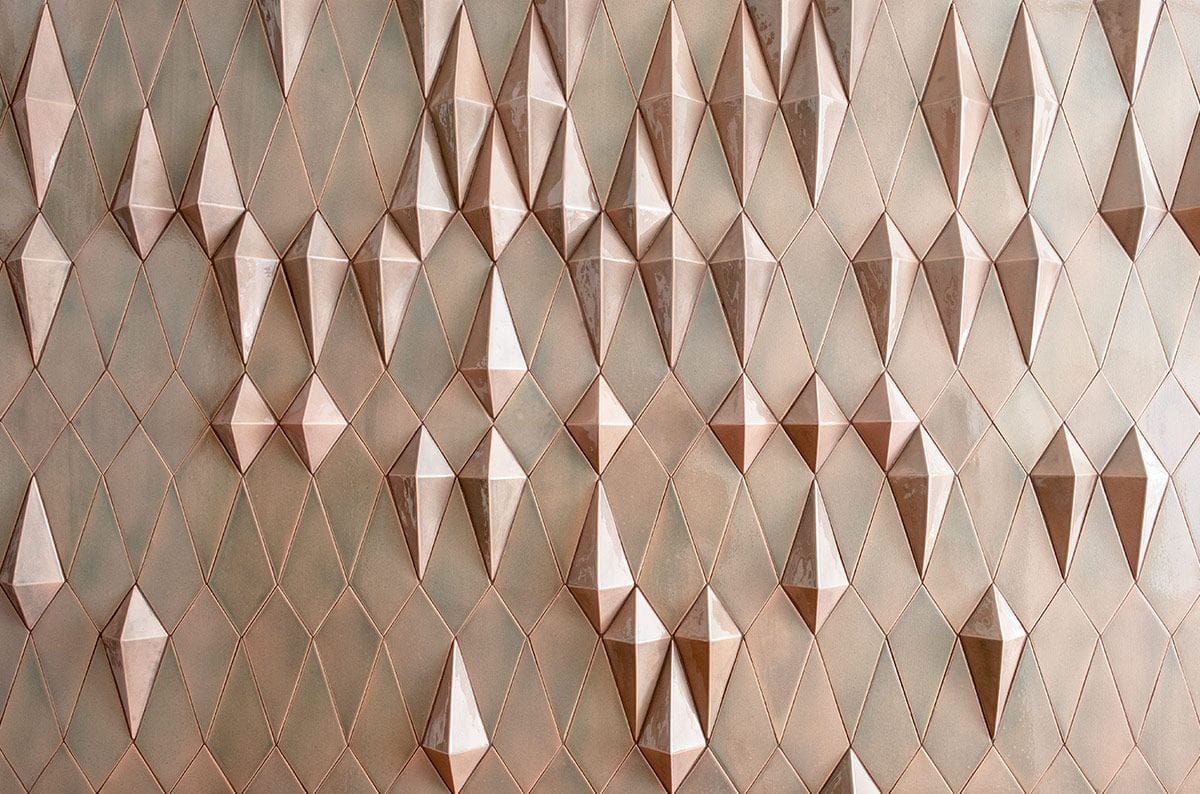 Interior tiles panels with 3-dimensional pieces. Very fashionable in the 21st century