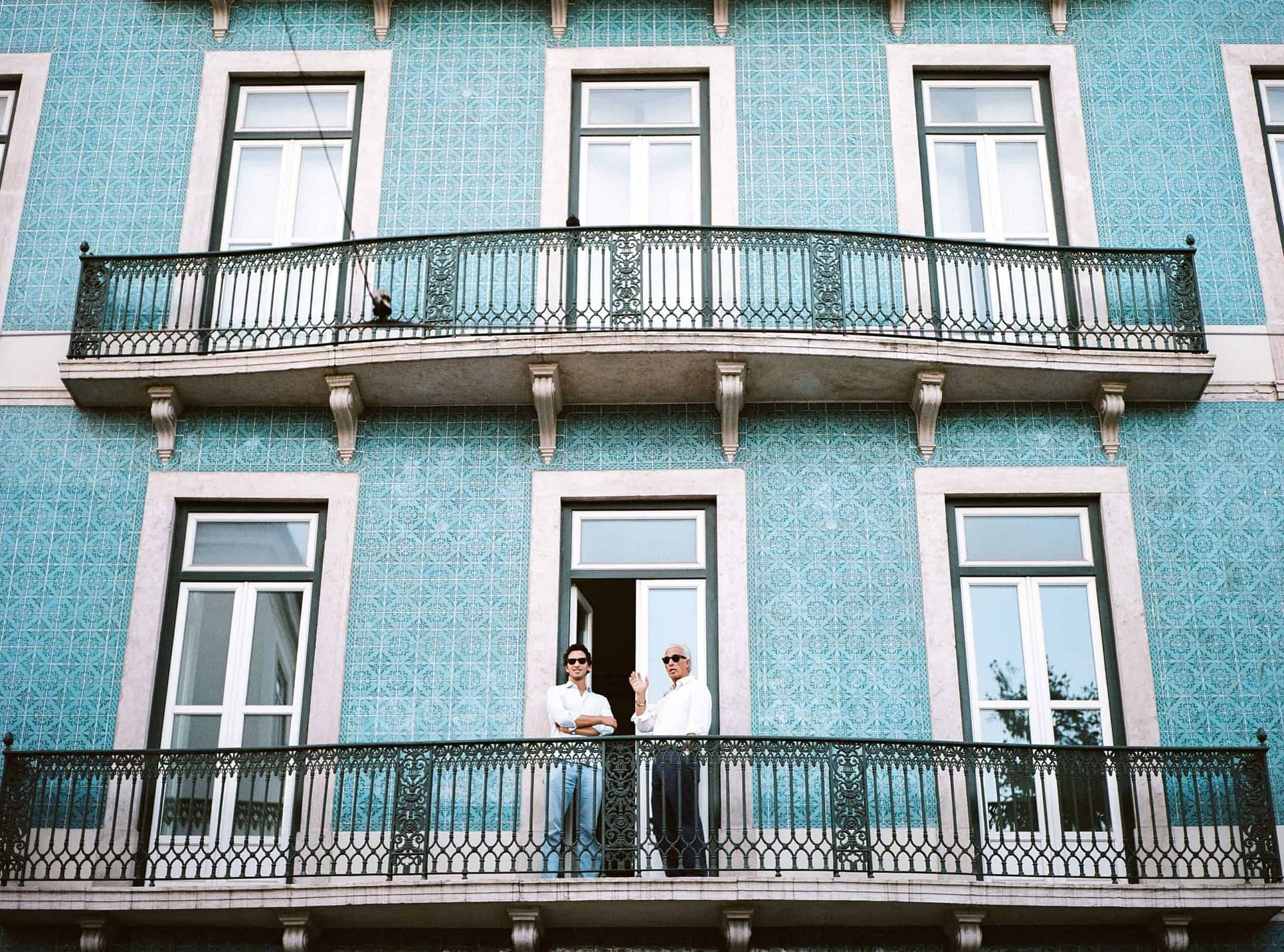 Investors in a typical Lisbon house covered with tiles. There are many investment opportunities in Lisbon