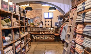 Shop in Alfama selling accessories and clothing made of high quality Portuguese wool from the Estrela mountain