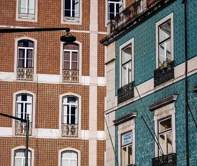 Typical Lisbon buildings covered with tiles called azulejos in the Graça district