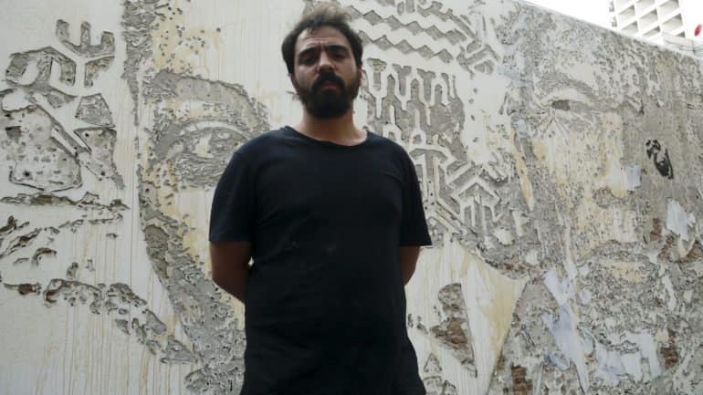 Vhils, artiste de street-art à Lisbonne mondialement connu