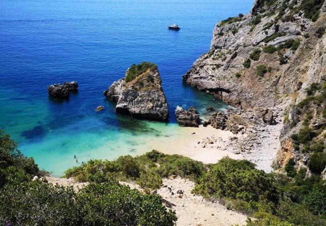 secret and secluded beach of lisbon in the arrabida park and near sesimbra, accessible by boat