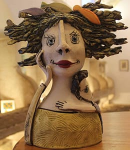 Objects, traditional souvenirs and creations of Portuguese craftsmen in a shop in Alfama near Lisbon Cathedral
