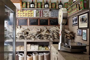Historic delicatessen located near Rossio Lisbon offering cheese, cold cuts, pata negra, Portuguese sardines