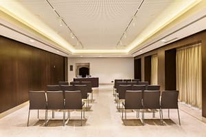 Fully equipped meeting room during your business seminar in Lisbon.