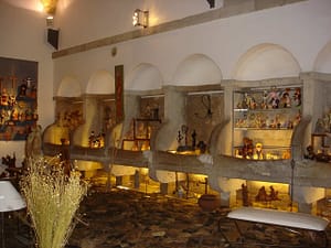 Objects, traditional souvenirs and creations of Portuguese craftsmen in a shop in Alfama near Lisbon Cathedral
