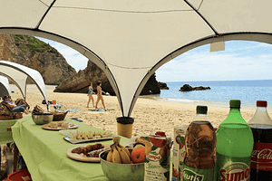 Day at a secluded beach in Serra da Arrabida near Lisbon with fun activities, buffet and lots of fun